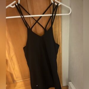 Workout tank with a build in bra